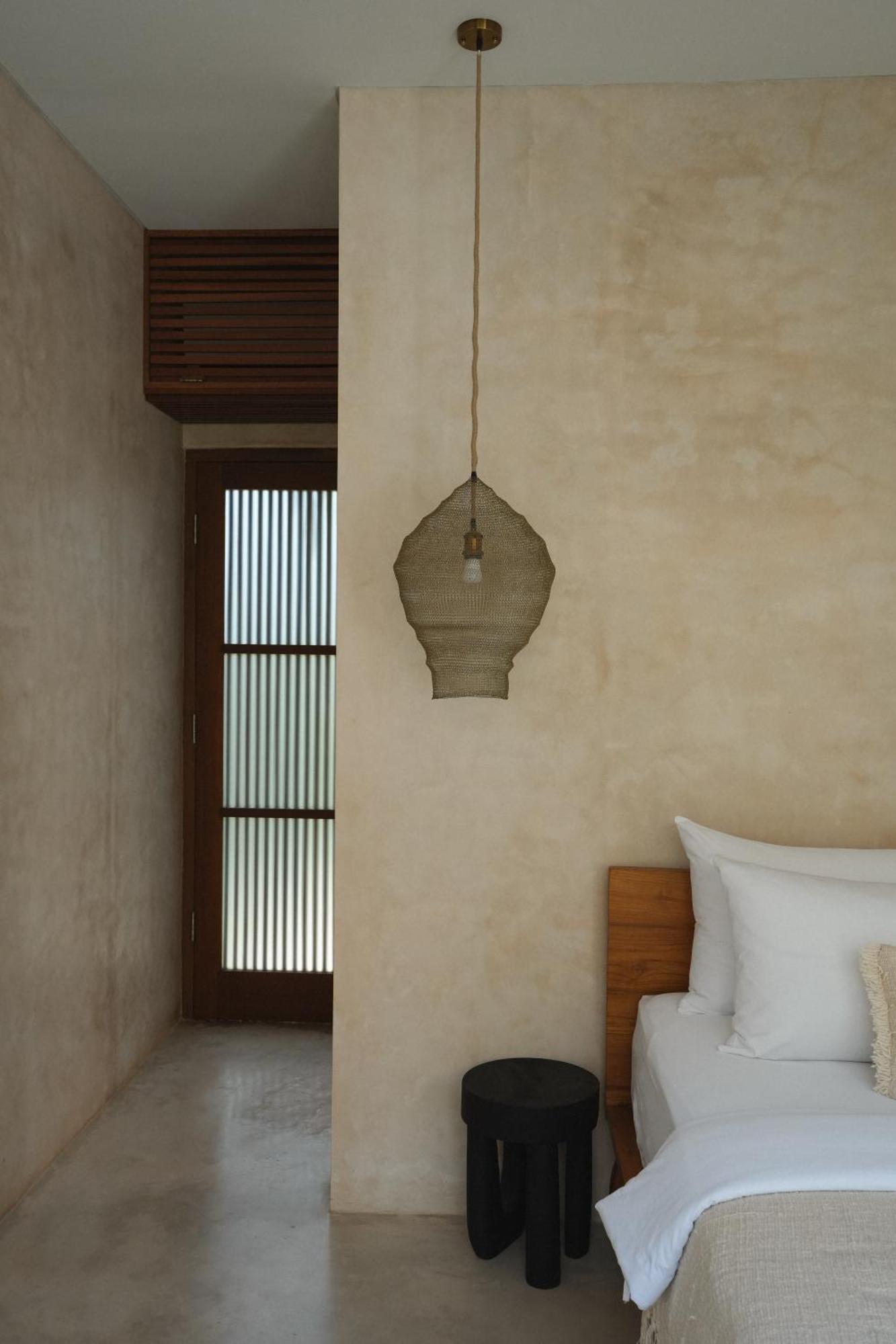 Alma Bingin Boutique Hotel Uluwatu Rom bilde